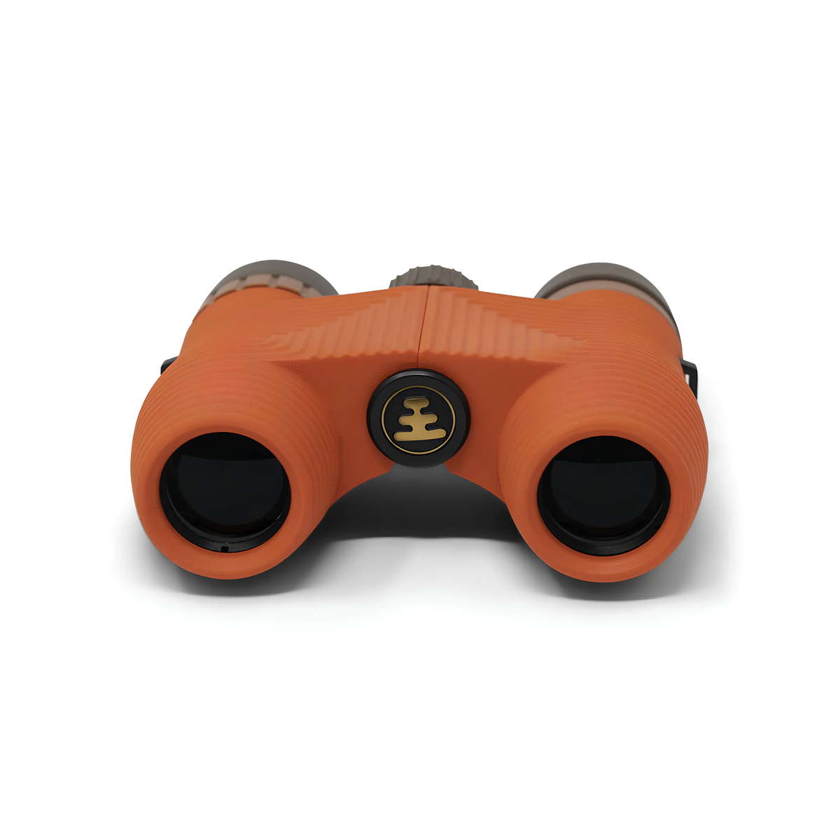 Facing the lenses of Nocs Provisions Binocular Standard Issue 8X25 Poppy Orange that has multi-coated lenses and premium BaK4 prisms, waterproof, fogproof and compact.