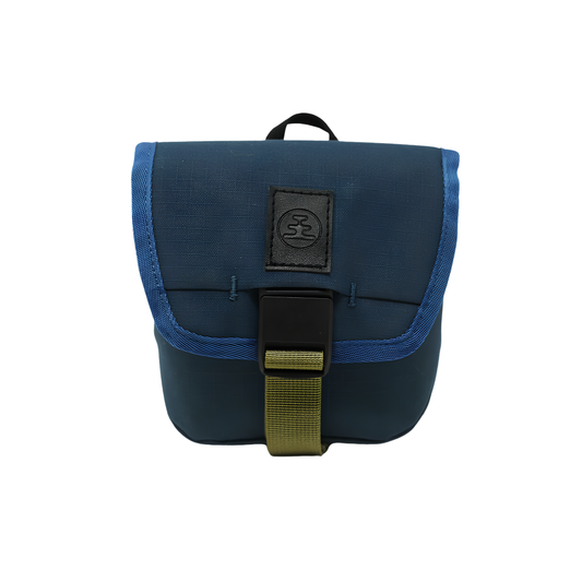 Front view of Nocs Provisions Binocular Standard Issue Pouch in harbor blue, recycled abrasion-resistant fabric with secure NocLoc closure, universal strap attachments and internal storage pocket, ideal for 25mm binocular.