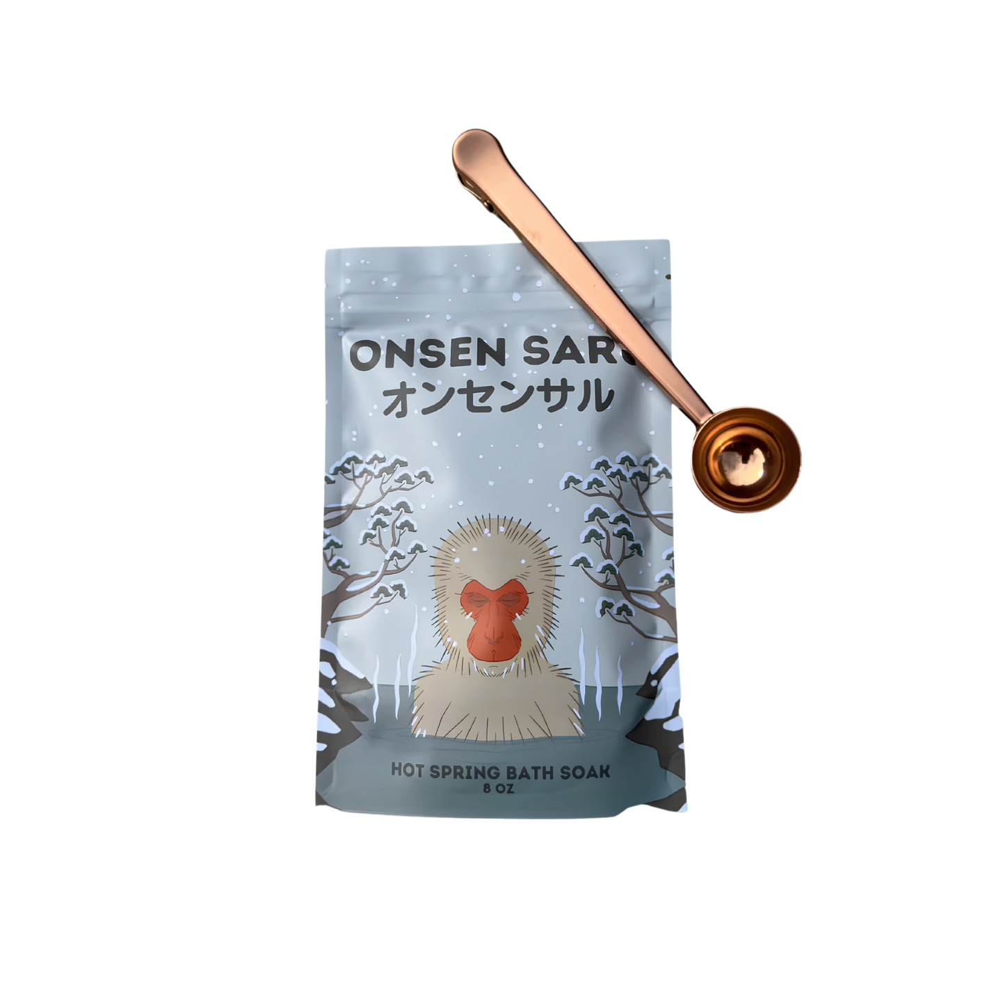 Front view of the packaging shown with a scoop from Onsen Saru Hot Spring Bath Soak with soothing blend of sea salts, magnesium flakes, Scent of Japanese Matsu Pine, Cedarwood and Snow, 8oz resealable bag