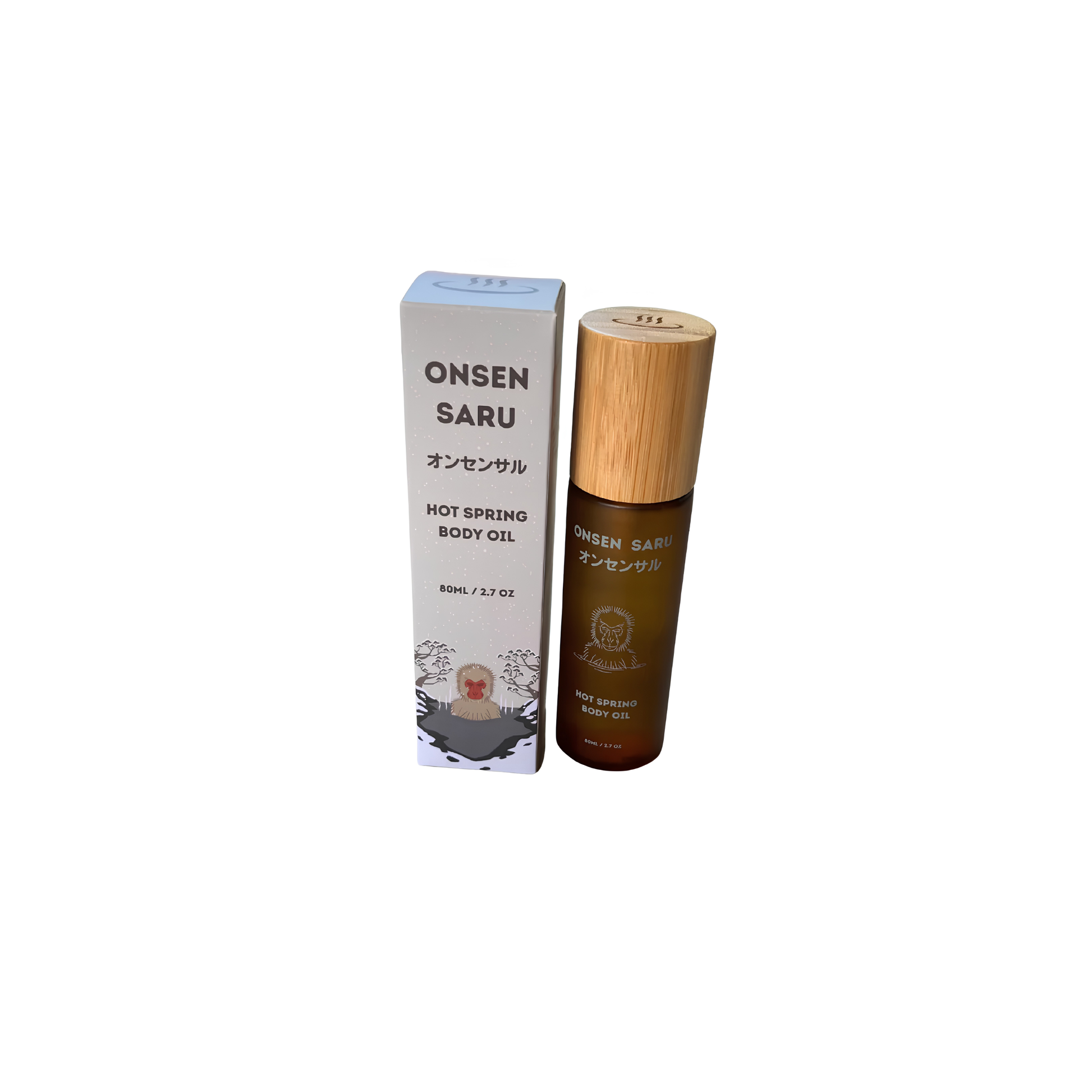 Packaging and the Onsen Saru Hot Spring Body Oil frosted amber glass bottle with black pump and bamboo collar.