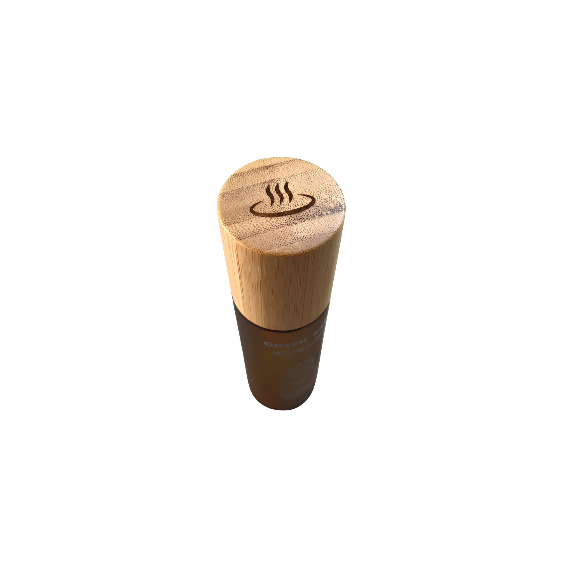 Laser engraved logo from the bottle cap of the Onsen Saru Hot Spring Body Oil frosted amber glass bottle with black pump and bamboo collar.