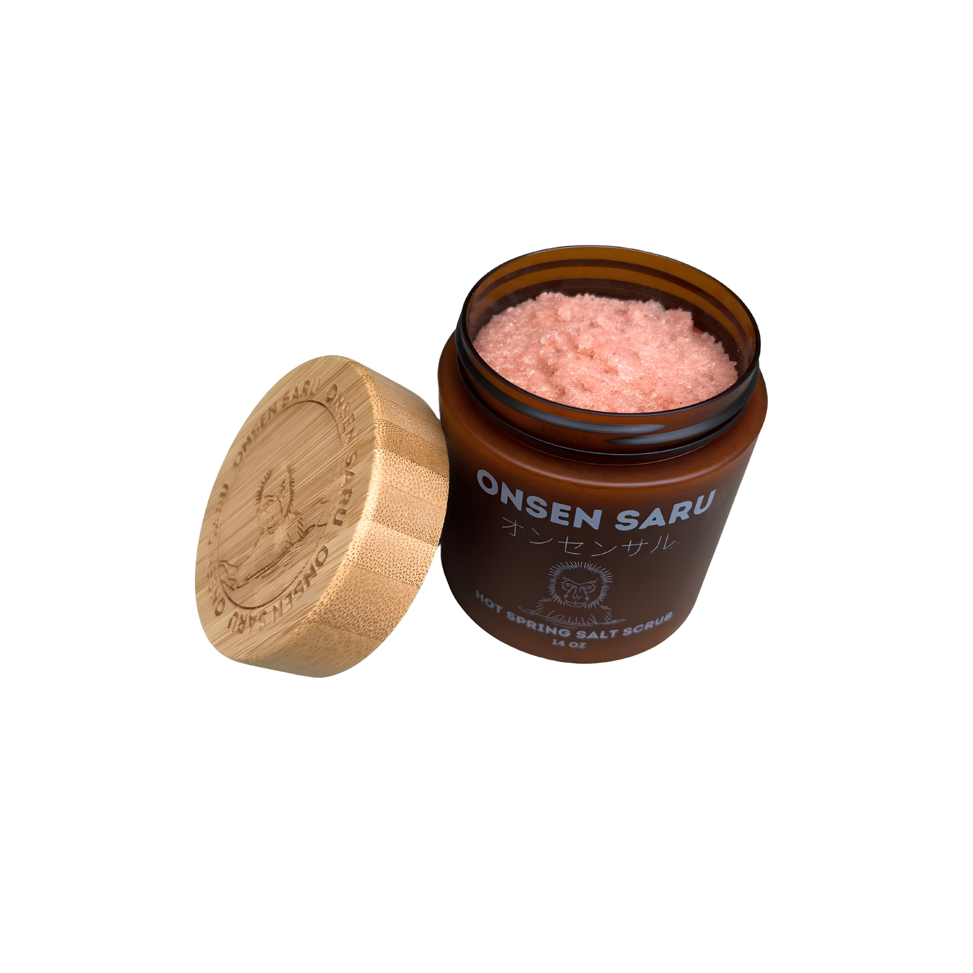 Front and open view of the Onsen Saru Hot Spring Salt Scrub 14oz jar, frosted amber plastic, engraved bamboo lid and cardboard box