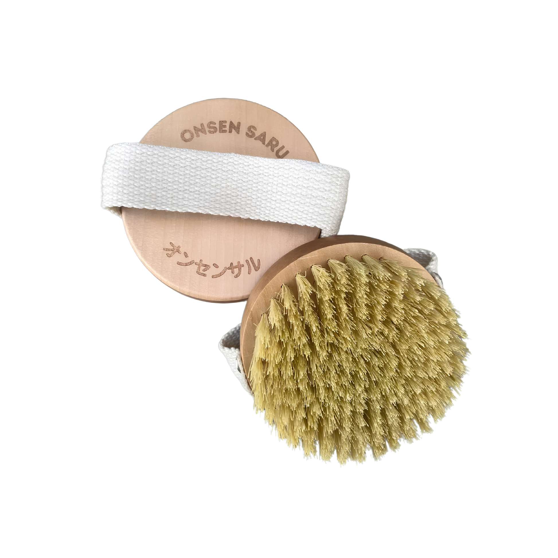 Front and back view of the Onsen Saru Sisal Dry Brush white pine base with sisal bristles, natural cotton webbing, engraved text logo and comes with mesh drawstring pouch.