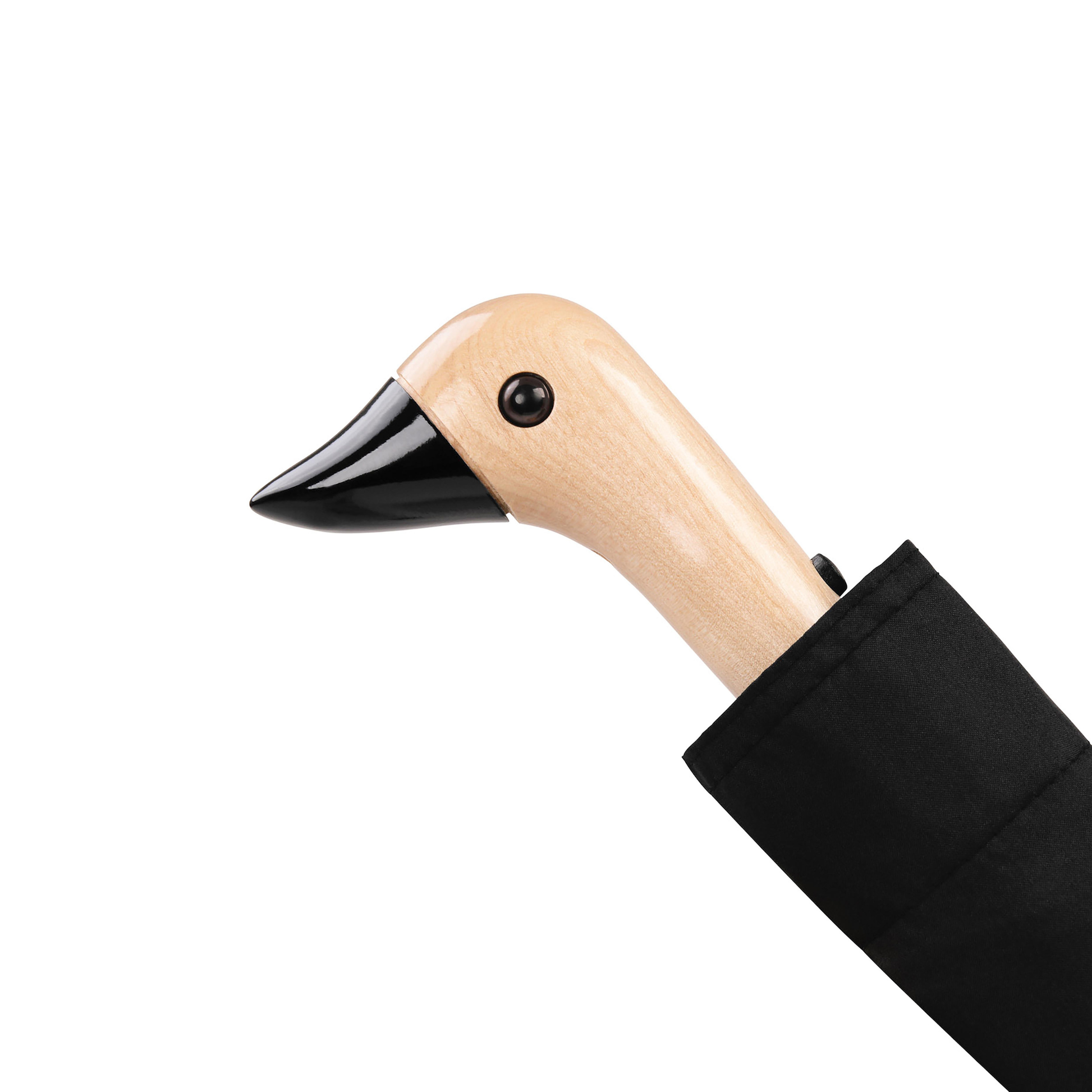 Close up on the duck head handle from the Original Duckhead Duck Umbrella Compact Black from 100% recycled plastic bottles and robust to keep you dry, it fits into any backpack or tote bag, it is wind resistant, has automatic open button and high-strength steel frame. For everyday use no matter the weather.