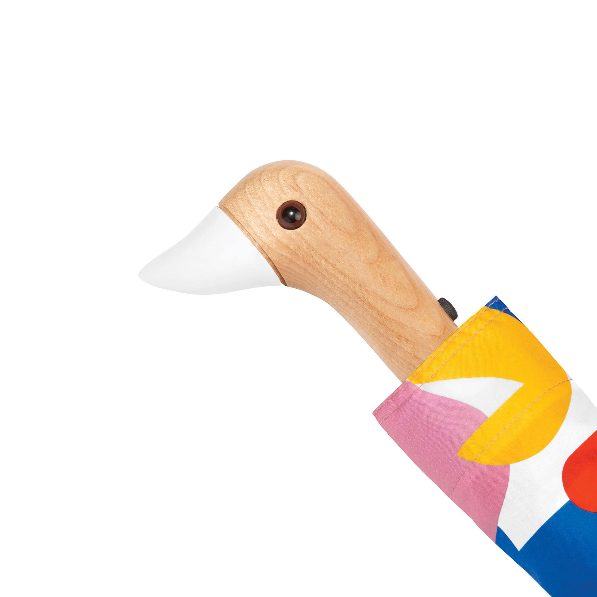 Close up on the duck head handle from the Original Duckhead Duck Umbrella Compact Matisse Print from 100% recycled plastic bottles and robust to keep you dry, it fits into any backpack or tote bag, it is wind resistant, has automatic open button and high-strength steel frame. For everyday use no matter the weather.