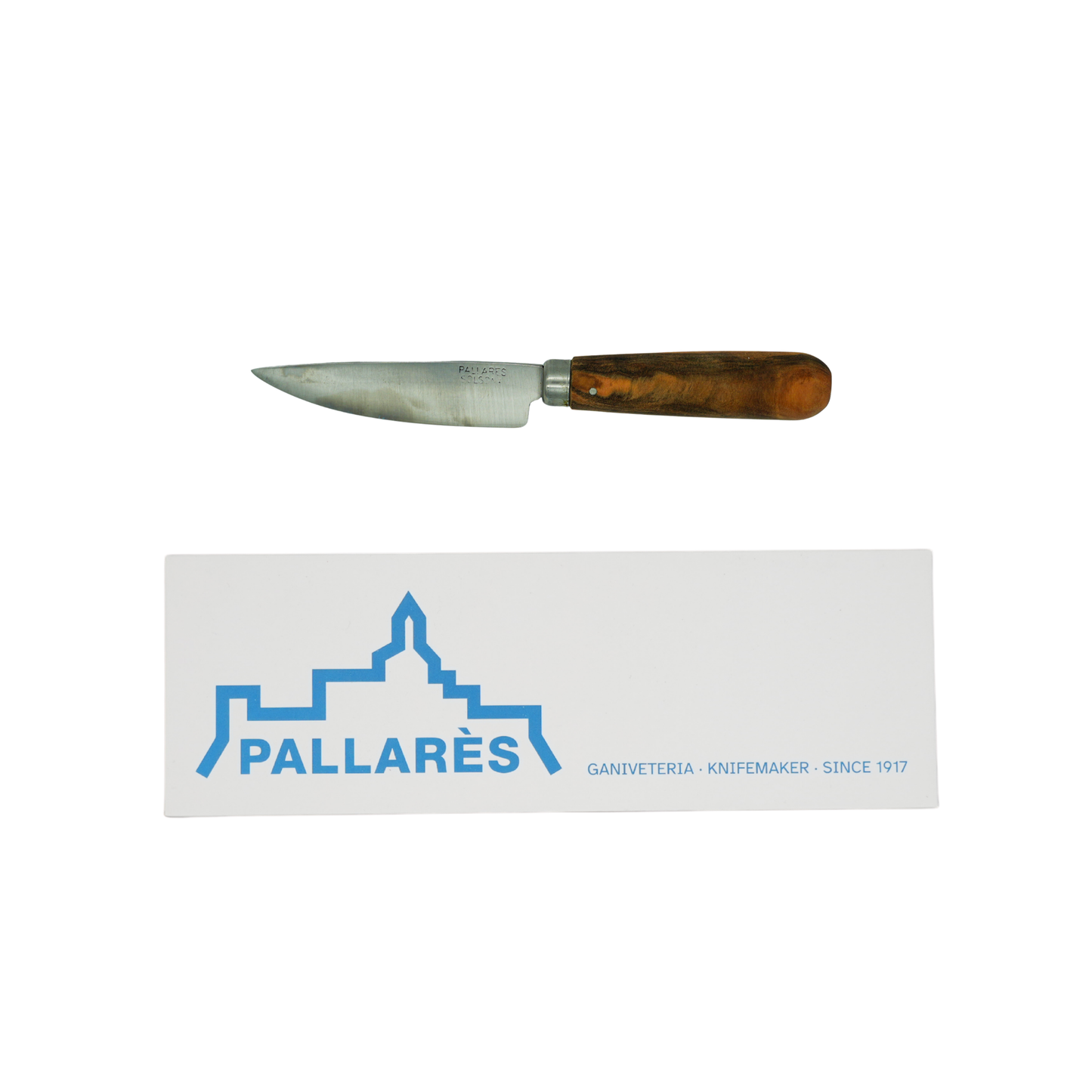 Showing the knife and the box from Pallares Solsona Kitchen Knife 8cm Straight Blade Carbon Steel Olive Wood Handle