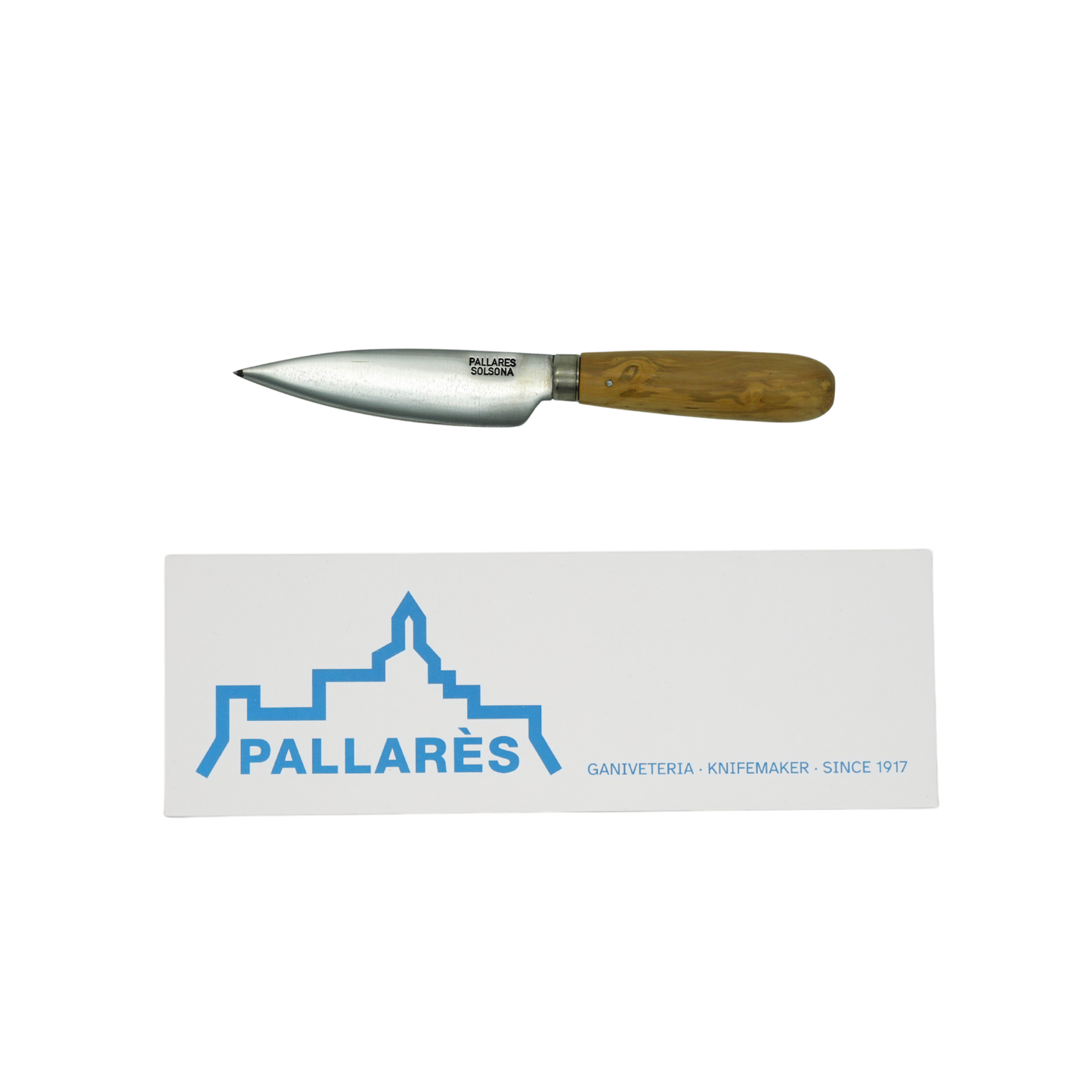 Showing the knife and the box from Pallares Solsona Kitchen Knife 9cm Wide Blade Carbon Steel Boxwood Handle.