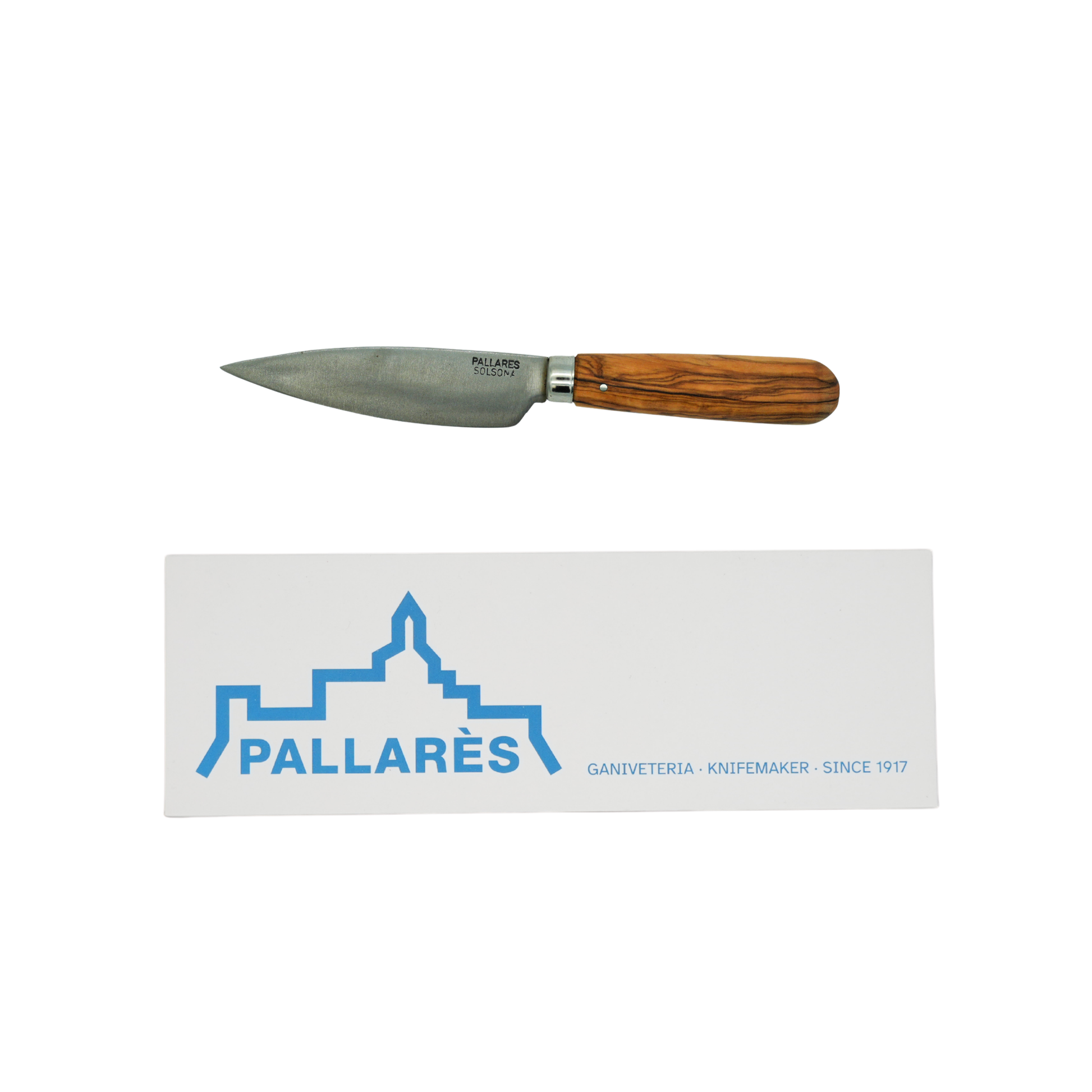 Showing the knife and the box from Pallares Solsona Kitchen Knife 9cm Wide Blade Carbon Steel Olive Wood Handle