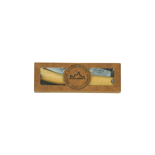 Shown inside a paper box, the Pallares Solsona Pocket Knife Busa 8cm Carbon Steel Boxwood Handle