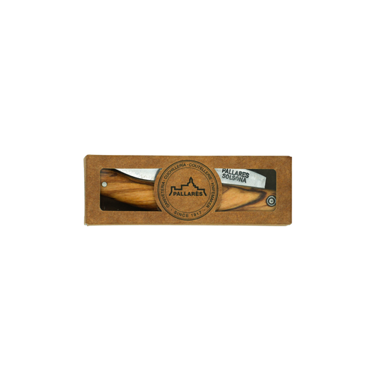 Shown inside a paper box, the Pallares Solsona Pocket Knife Busa 8cm Carbon Steel Olive Wood Handle