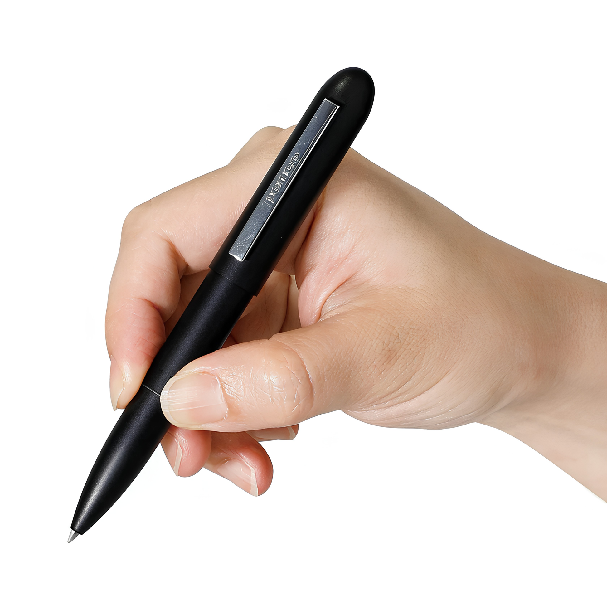Shown held by a hand, the Penco Bullet Ballpoint Pen Black that is a Japanese made brass body, with an impressive heft for a pocket friendly option, with black ink and at 9.3cm long when closed