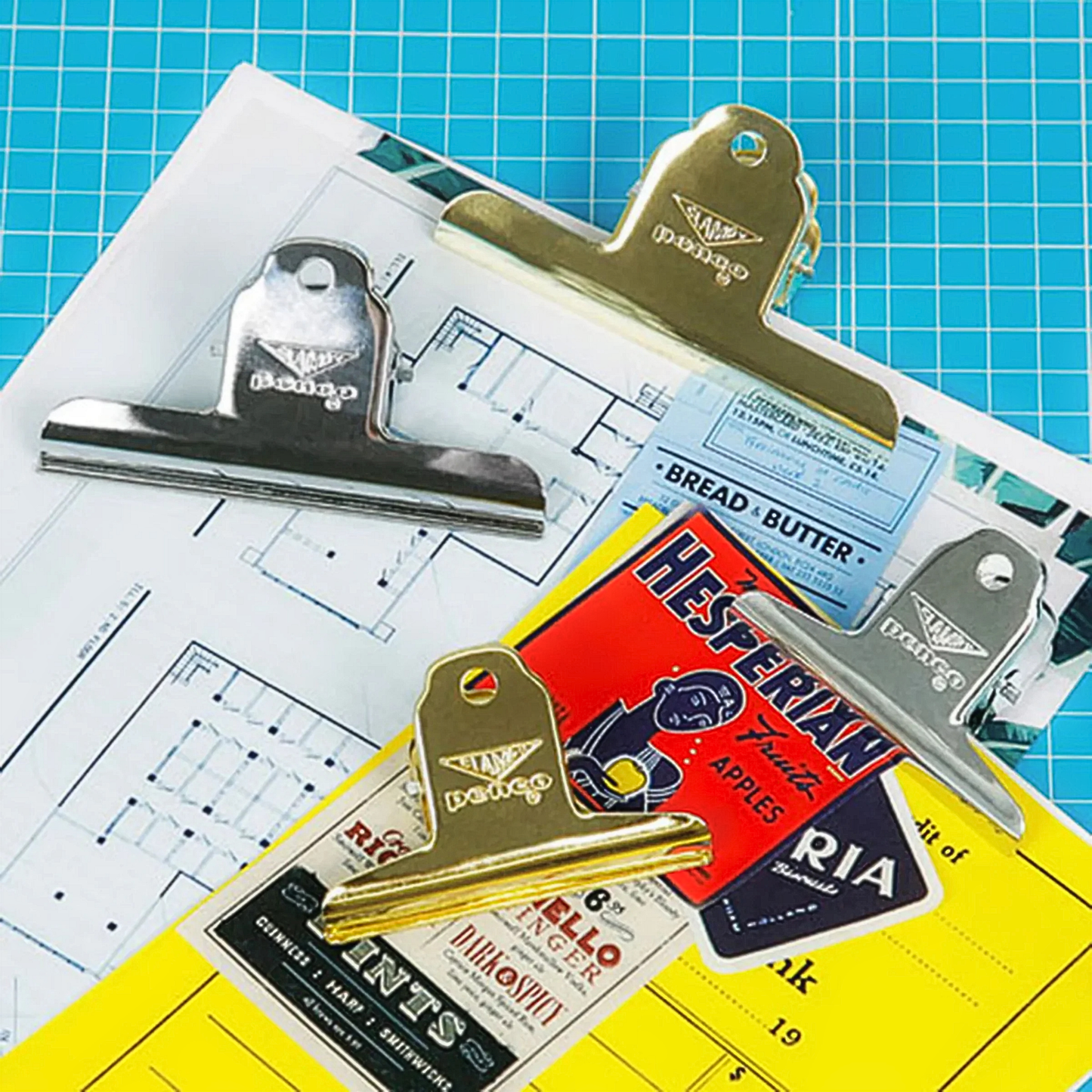 Metal small Penco clip on table with medium Penco clips 