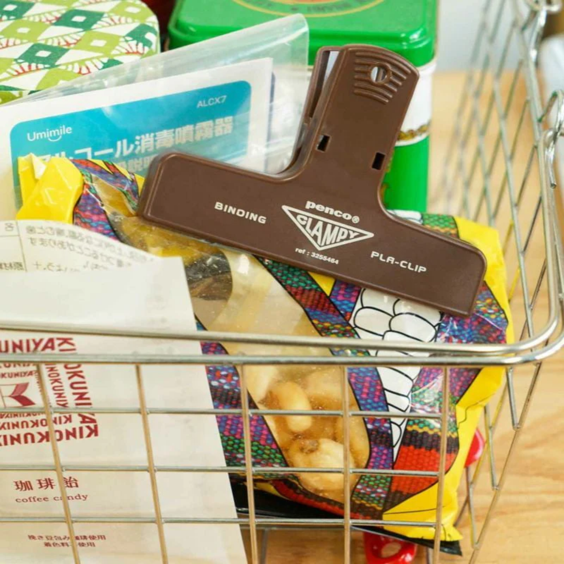 Penco plastic brown clip on chip packet in wire basket