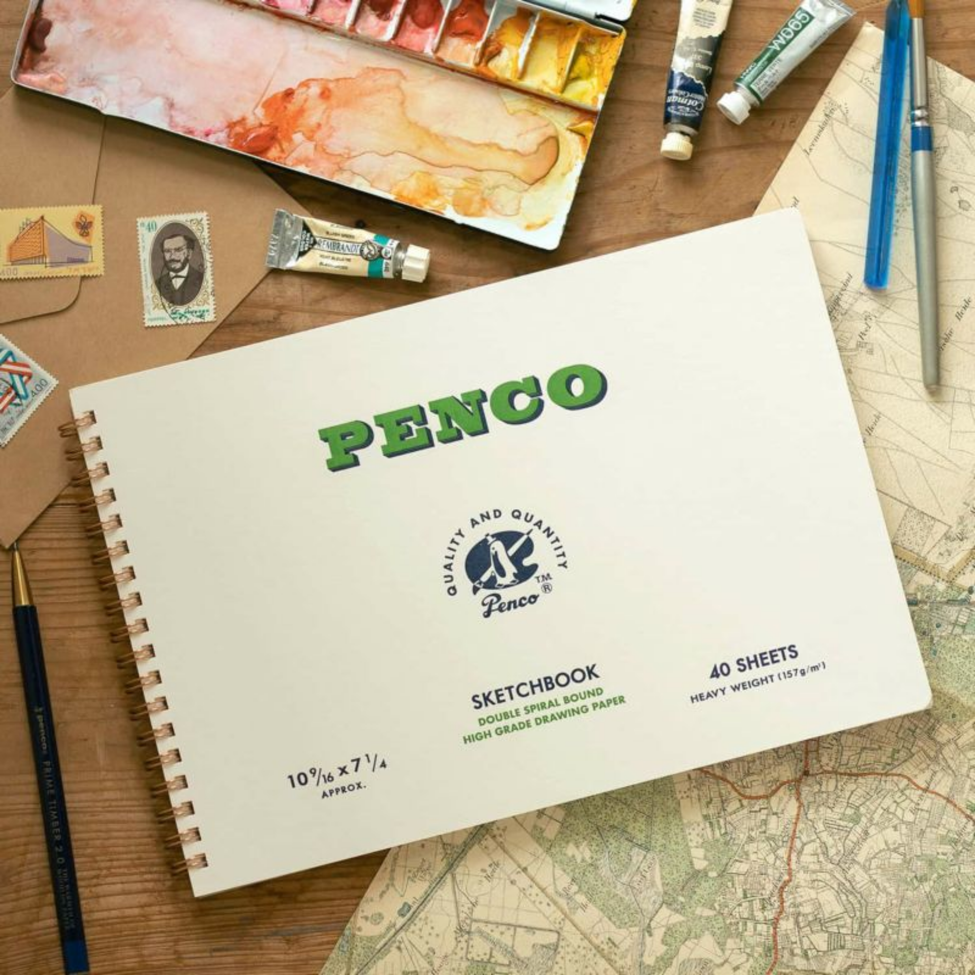 Penco spiral sketch book B5 on display with paint and art supplies