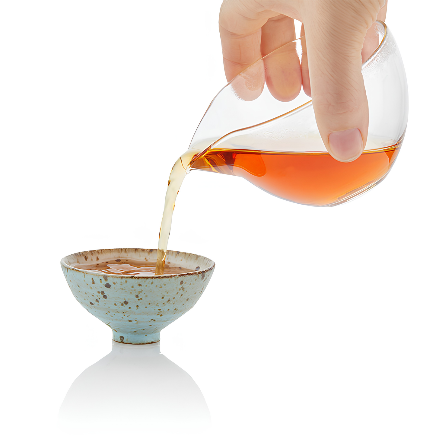 Pouring the blend in a small bowl, using the Ripple Effect Tea Co Loose Leaf Tea 100g Ruby Breakfast, pure Ceylon tea leaves from Nilgiris, fresh and organic.