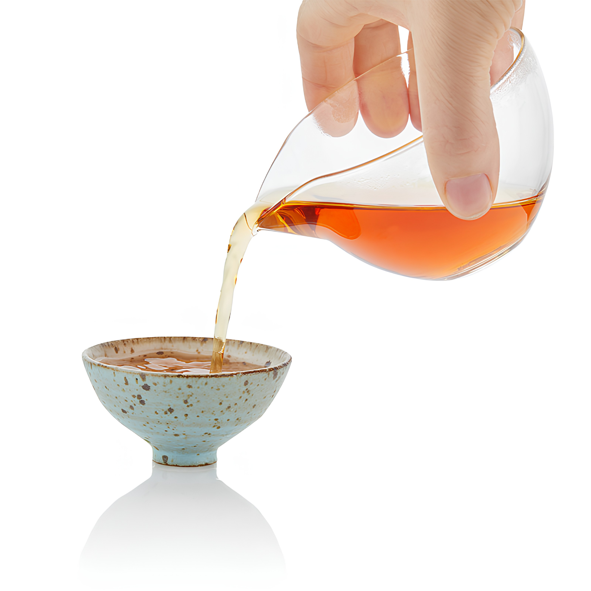 Pouring the blend in a small bowl, using the Ripple Effect Tea Co Loose Leaf Tea 100g Ruby Breakfast, pure Ceylon tea leaves from Nilgiris, fresh and organic.