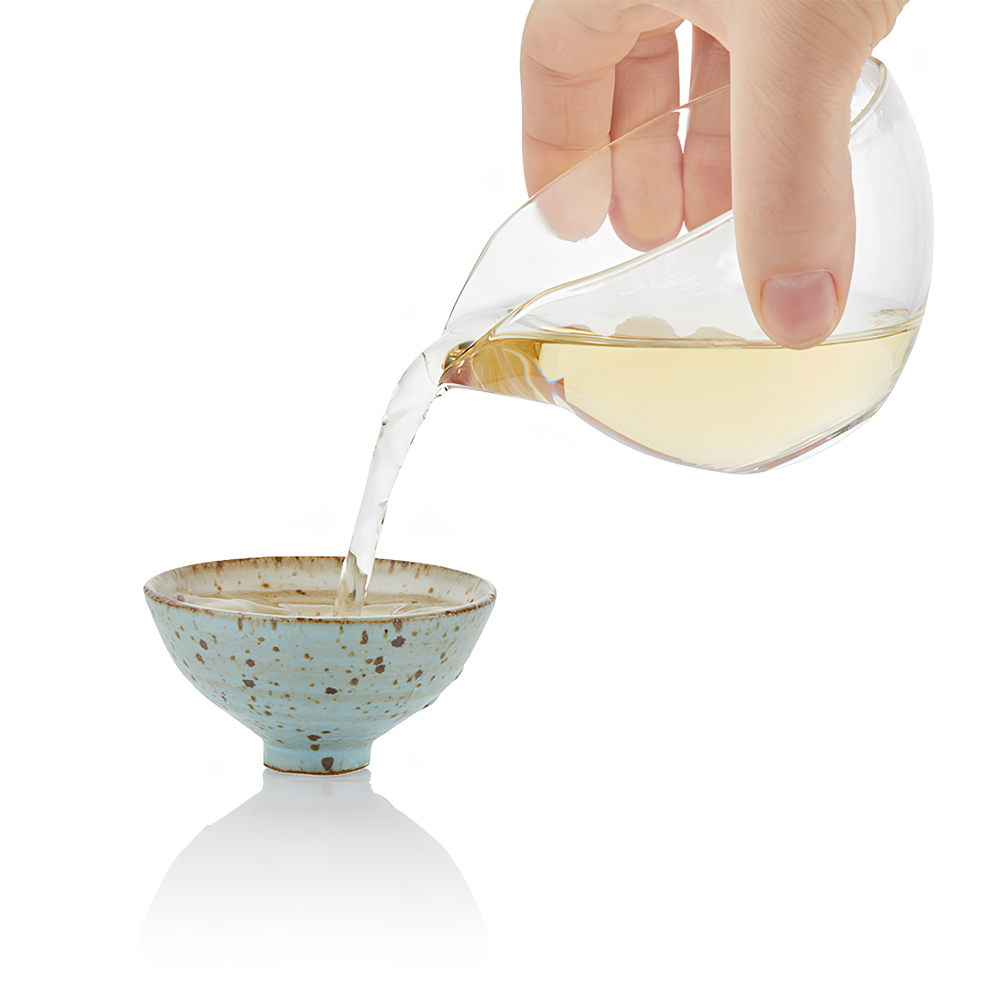 Pouring the blend in to a bowl, using the Ripple Effect Tea Co Loose Leaf Tea 30g Moonlight Rose, dry leaves which are white on the side and shadowy black on the other