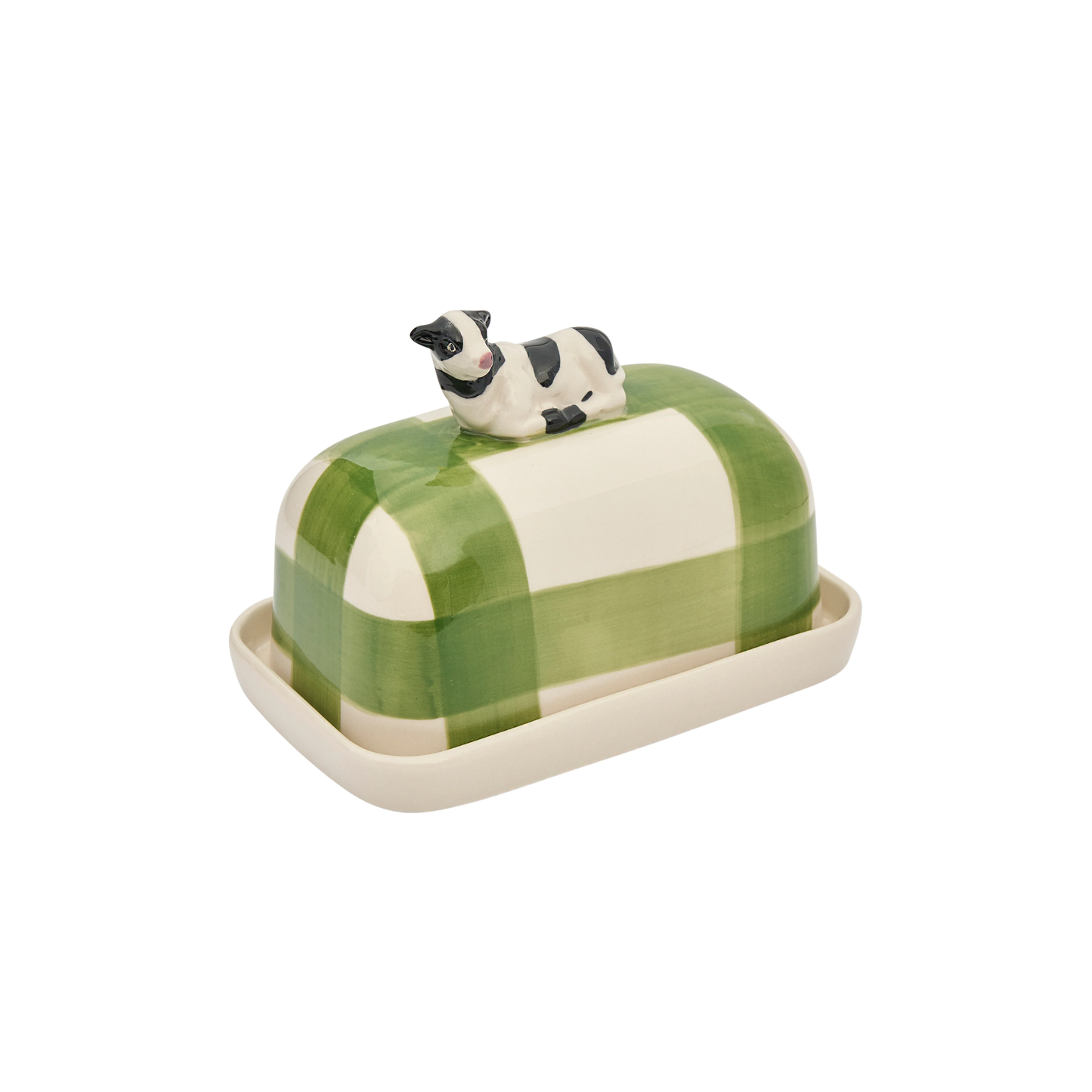 Down left facing Robert Gordon Butter Dish Cow made from high fired porcelain with green brushwork lines and a hand-painted cow perched on top.