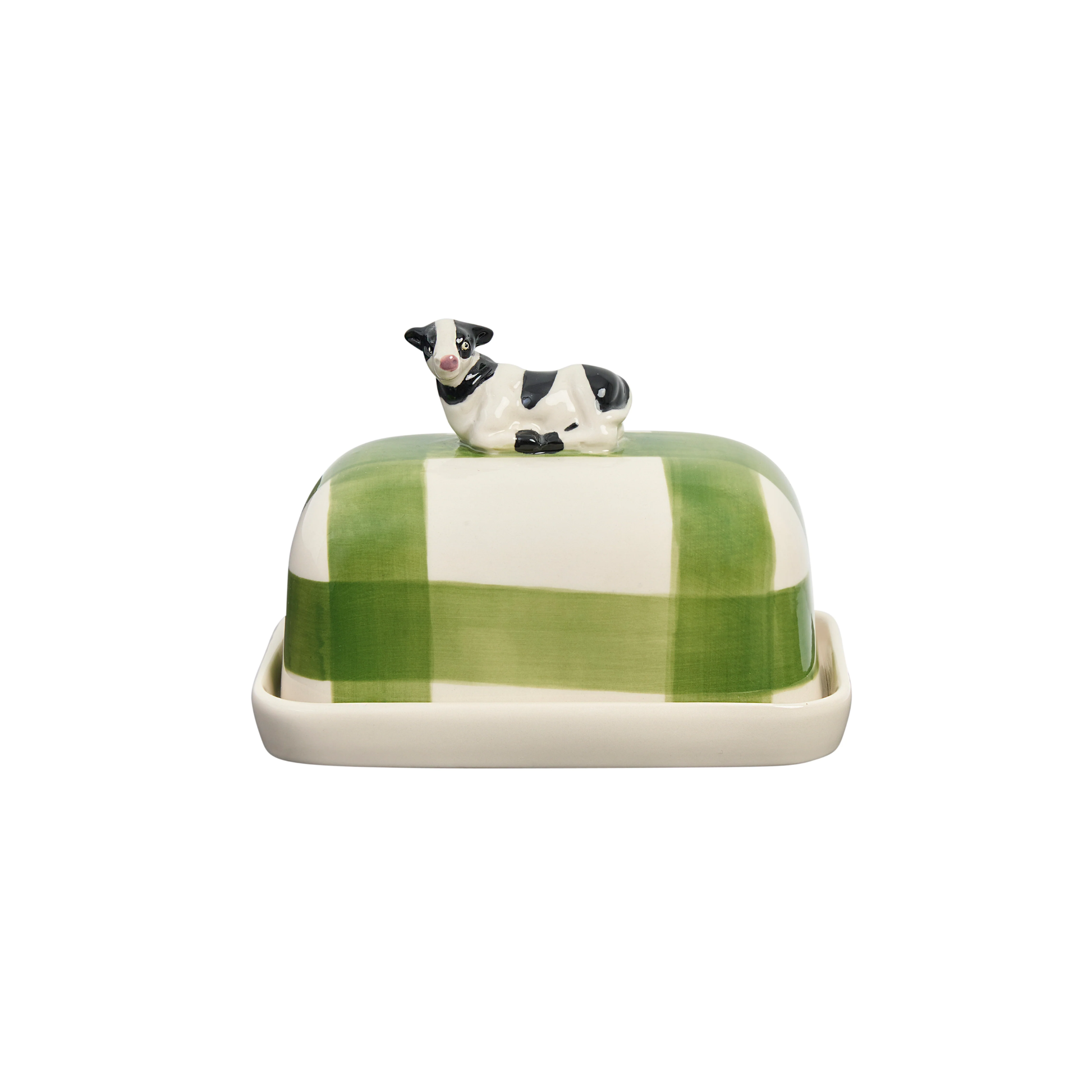 Side view of the Robert Gordon Butter Dish Cow made from high fired porcelain with green brushwork lines and a hand-painted cow perched on top.