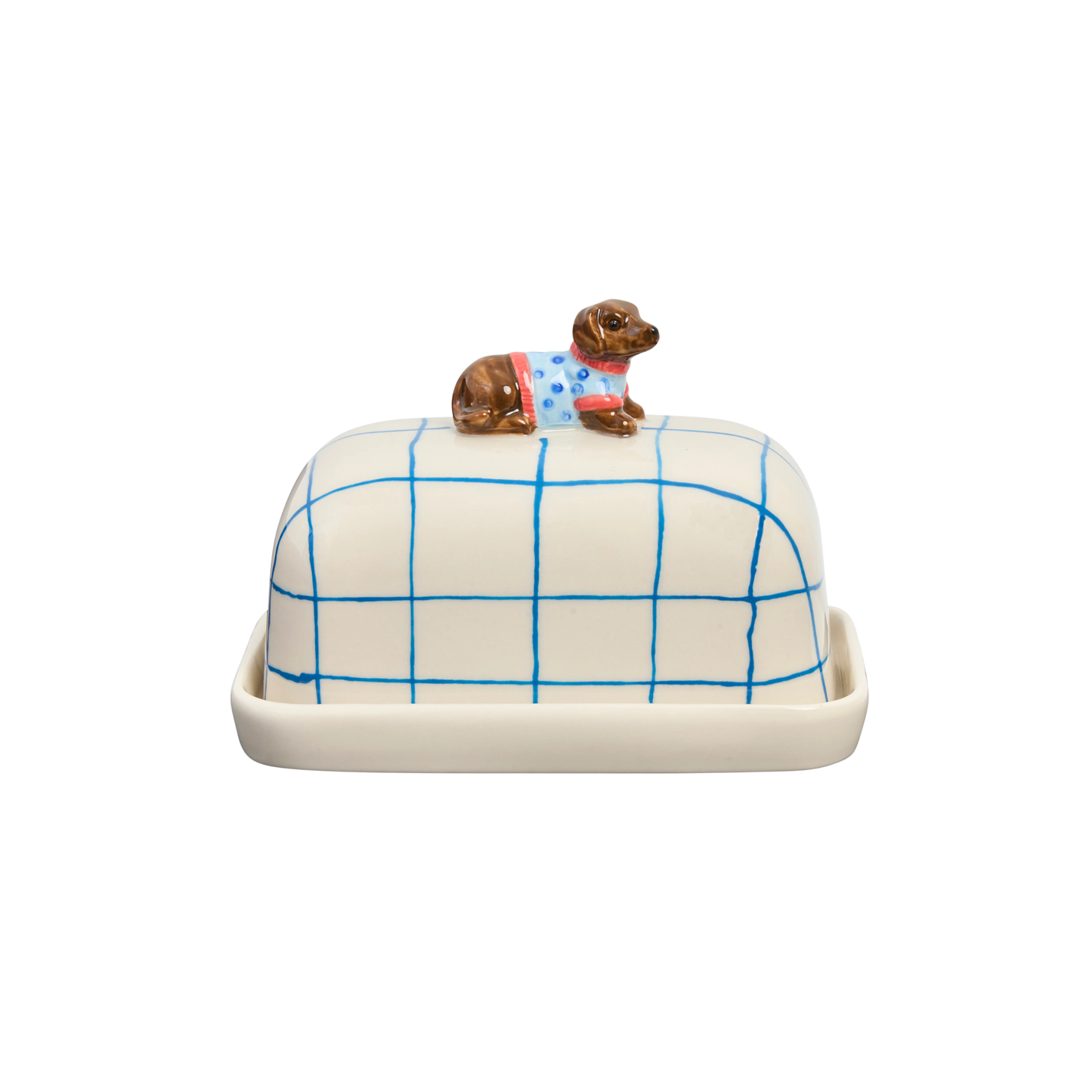 Side view of the Robert Gordon Butter Dish Dachshund made from high fired porcelain with blue brushwork lines and a hand-painted dog perched on top.