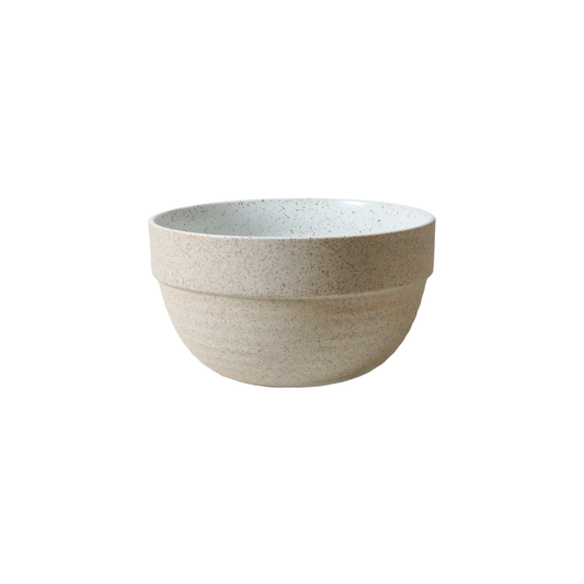 Slightly top view of the Robert Gordon Garden To Table Pudding Bowl 1L 16x11cm Off-white Earthly clay body with light organic glaze and dark speckles, hand crafted made from stoneware, microwave and dishwasher safe, designed in Australia, made in China.