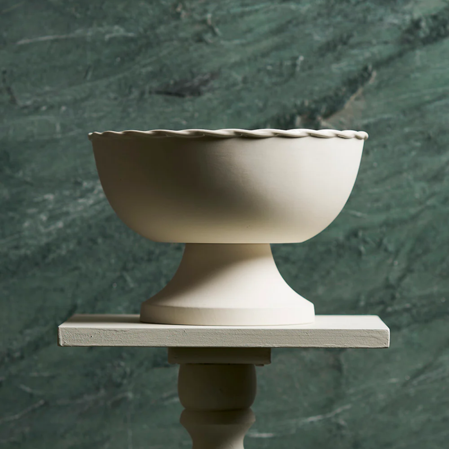 Robert Gordon vintage table fruit bowl vanilla side view on display on table with green marble background