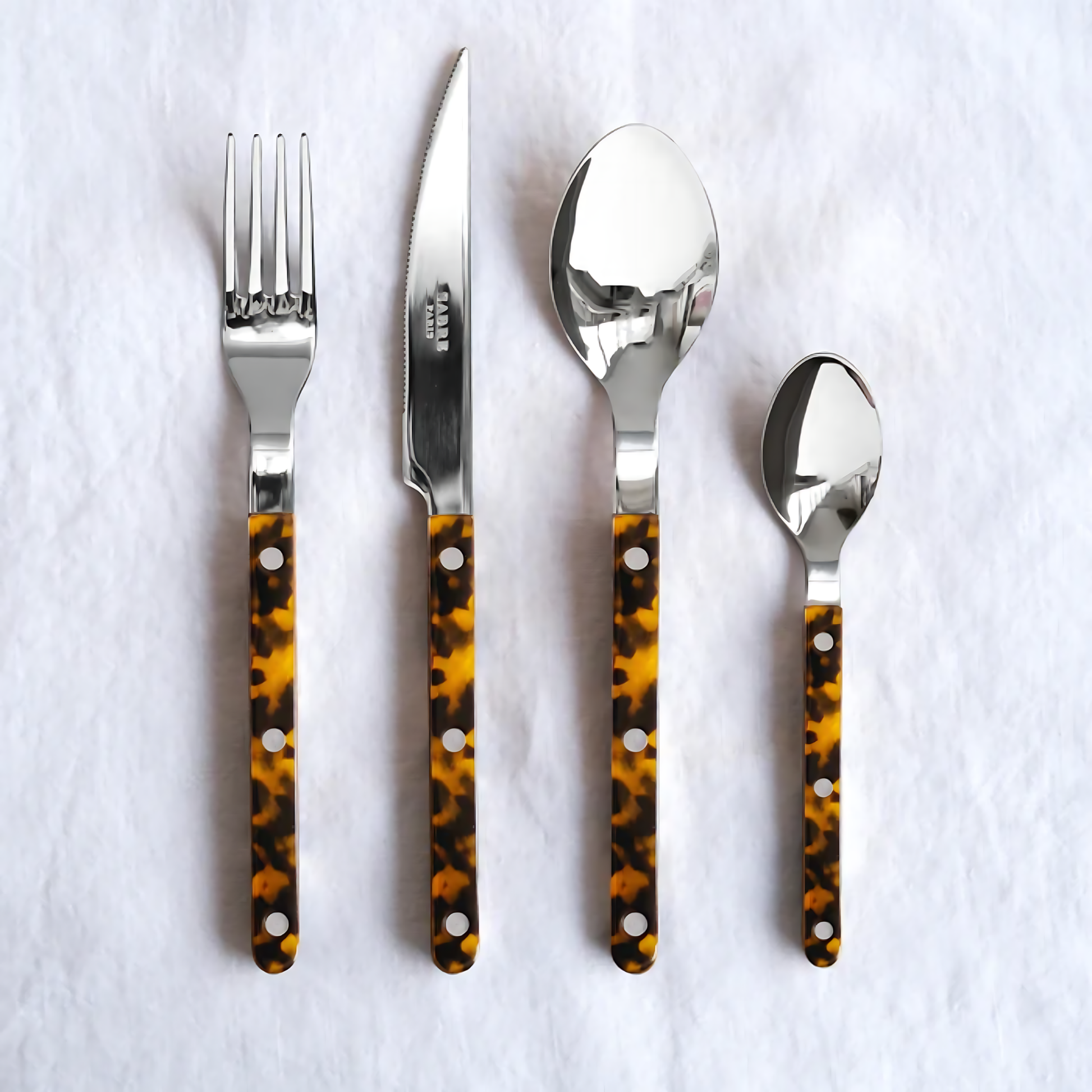Fork, knife, spoon and teaspoon from Sabre Bistrot Cutlery Tortoise 24 Piece Set