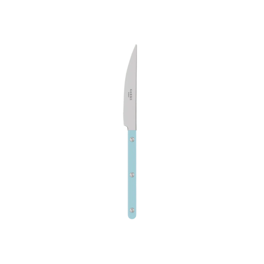 Sabre Paris Bistrot Dinner Knife Pastel blue- 24cm stainless steel knife with colorful nylon handle and visible rivets. Features a sharp blade for elegant dining, inspired by classic French bistros with a modern touch. Dishwasher-safe, available in gloss or vintage finishes.