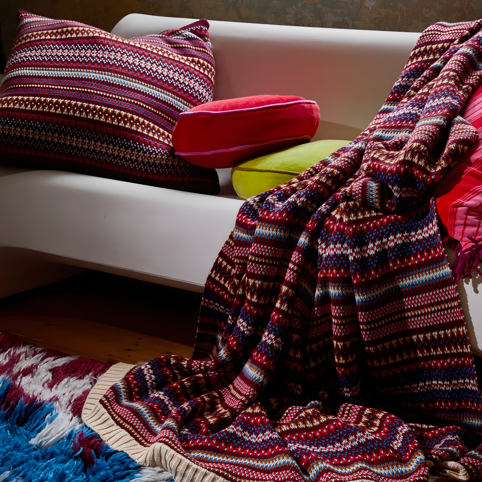 Seen on another couch, Sage & Clare Arlette Knit Cushion in Mahogany, a 65×65cm cotton Fair Isle textured decorative throw pillow with premium soft insert.