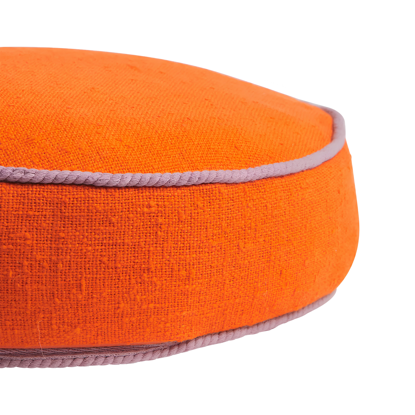 Another close up on the cord piping from the Sage & Clare Cushion Dana Round Orangerie made from cotton in block colours, with contrasting cord piping and high quality insert.