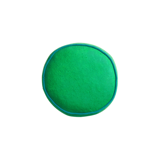 Front view of the Sage & Clare Cushion Dana Round Spring Green made from cotton in block colours, with contrasting cord piping and high quality insert.