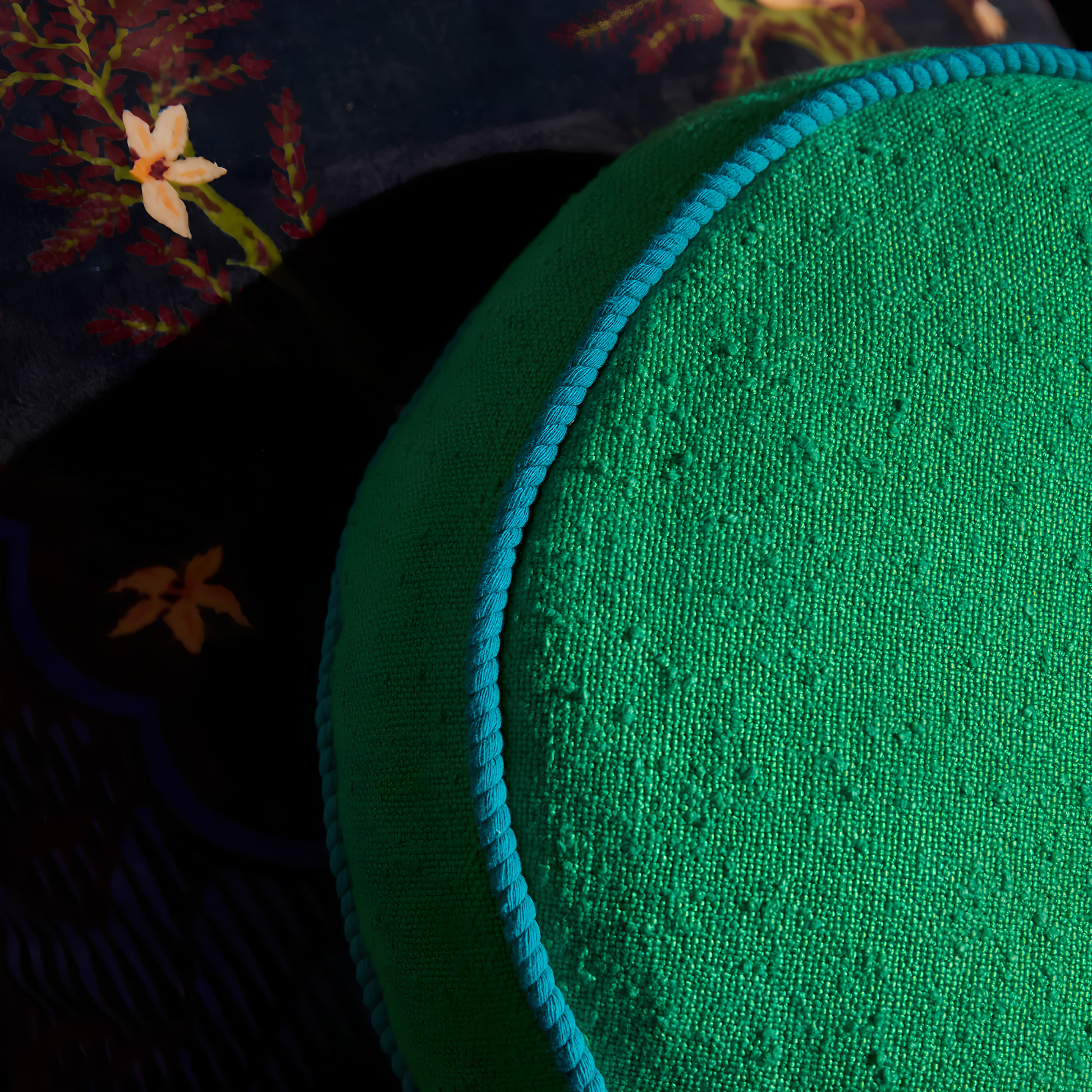 Close up on the cord piping of the Sage & Clare Cushion Dana Round Spring Green made from cotton in block colours, with contrasting cord piping and high quality insert.