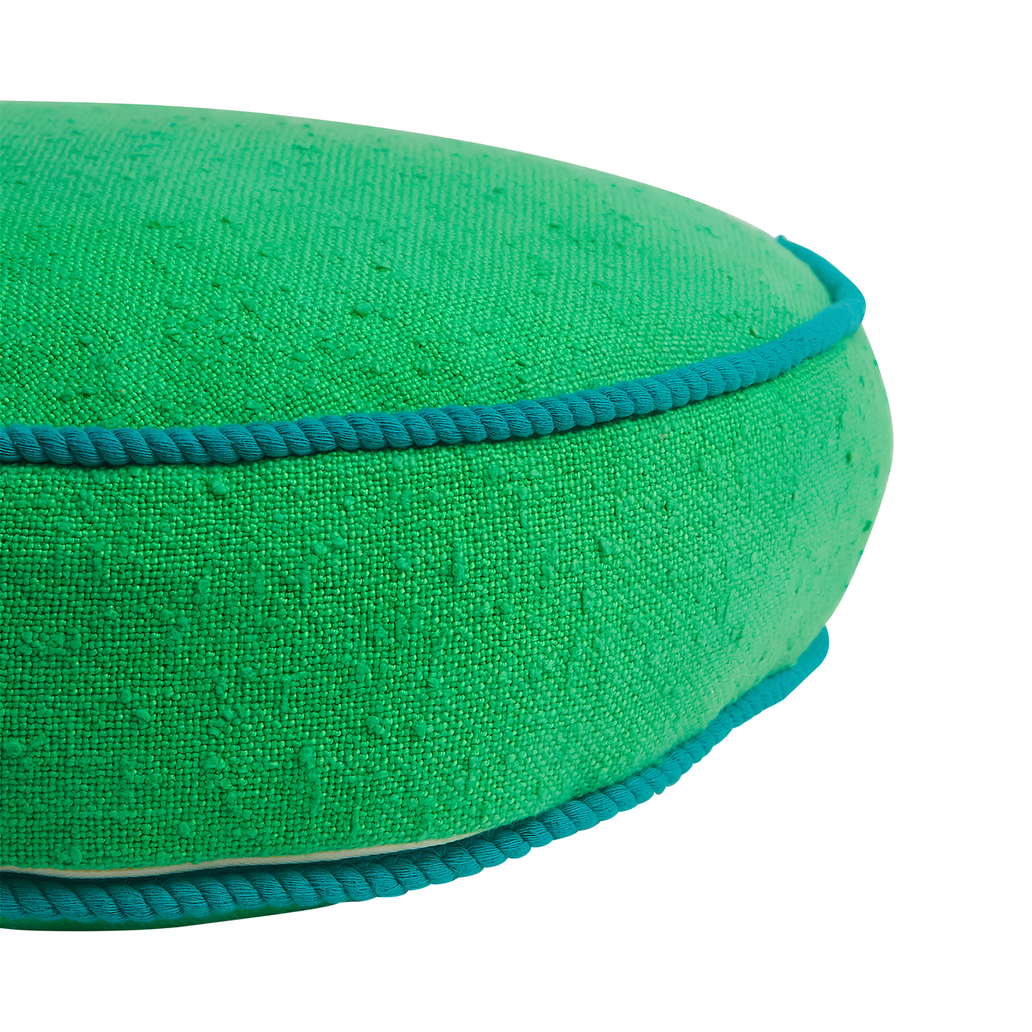Another close up view of the cord piping of the Sage & Clare Cushion Dana Round Spring Green made from cotton in block colours, with contrasting cord piping and high quality insert.