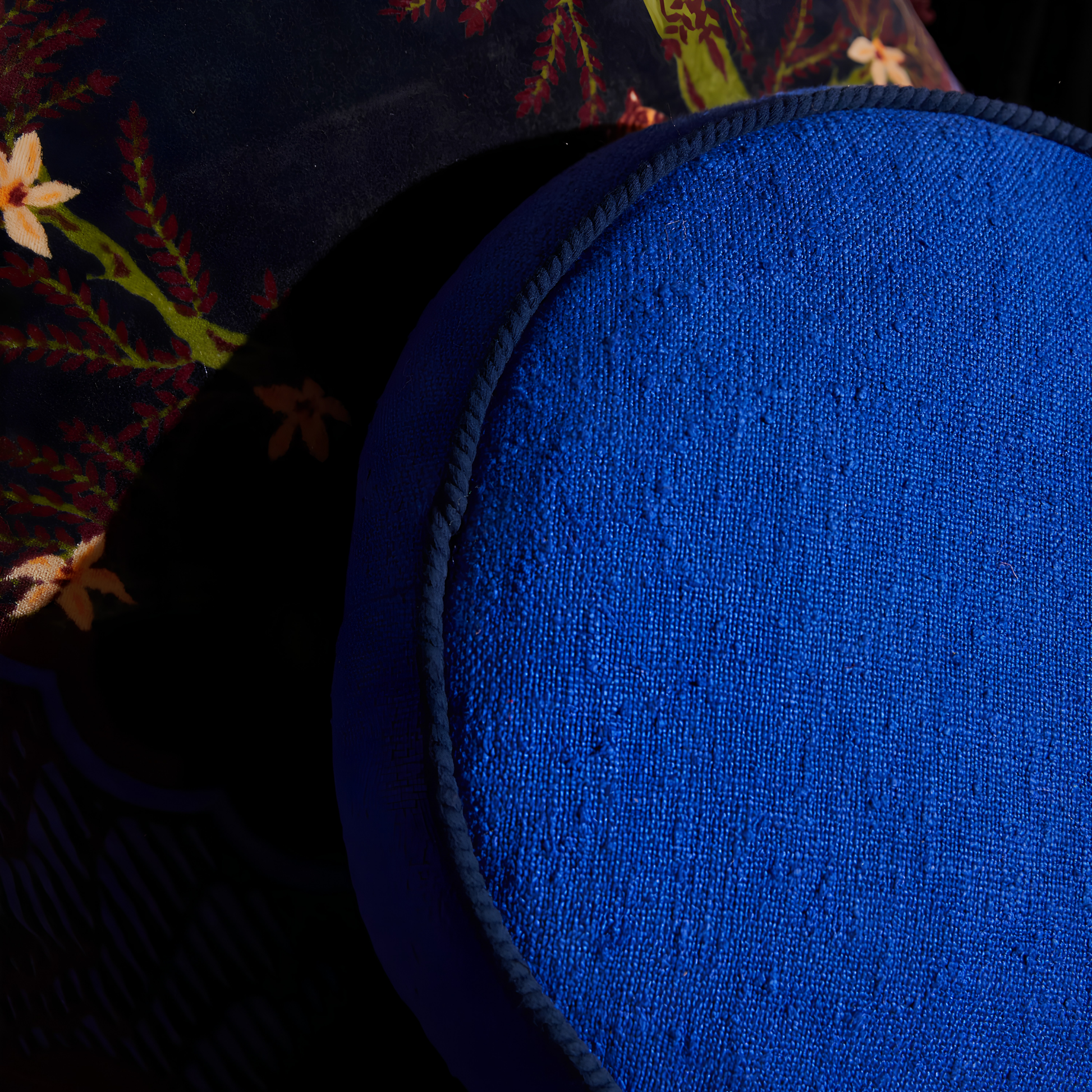 Close up on the cord piping of the Sage & Clare Cushion Dana Round Ultramarine made from cotton in block colours, with contrasting cord piping and high quality insert.