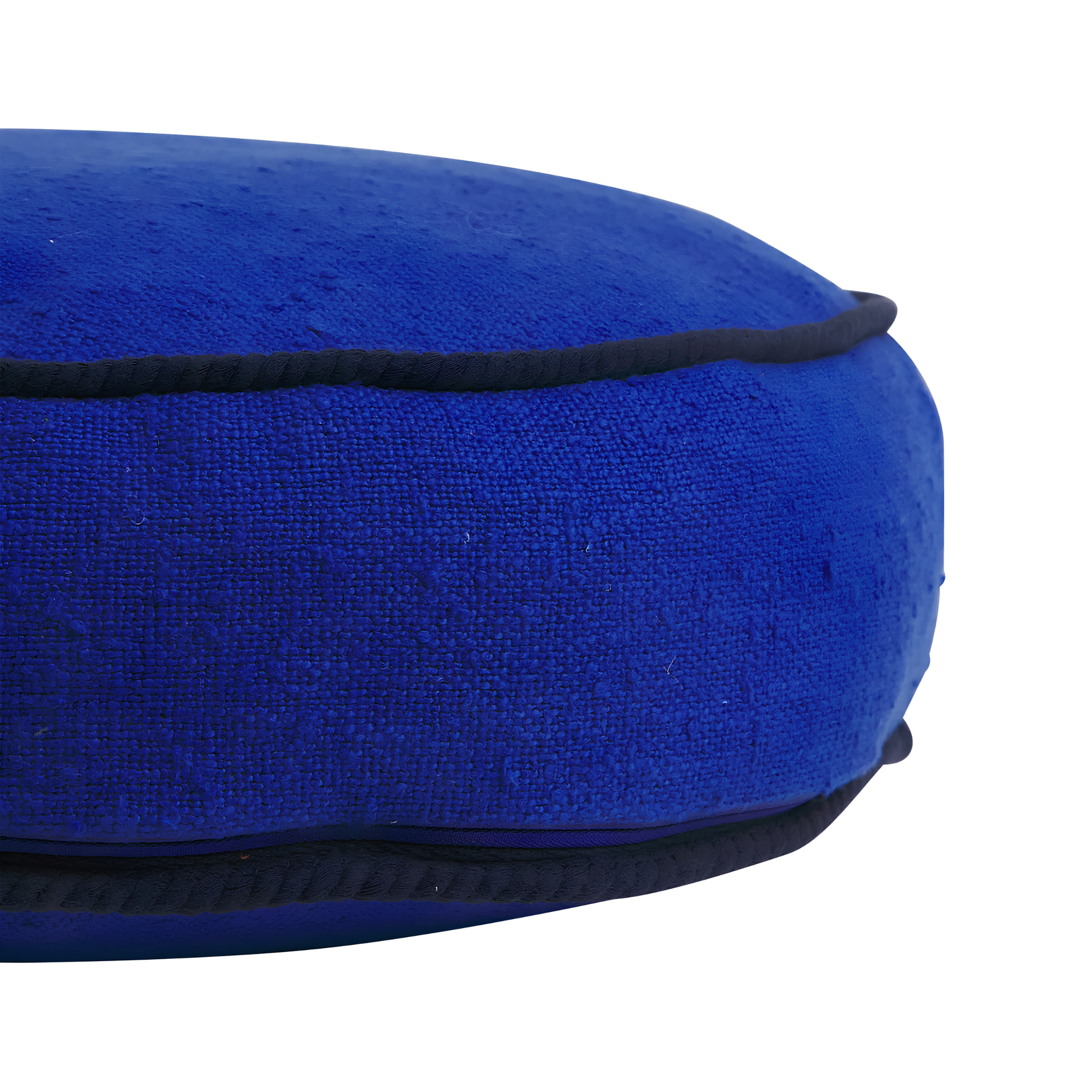 Close up side view of the Sage & Clare Cushion Dana Round Ultramarine made from cotton in block colours, with contrasting cord piping and high quality insert.