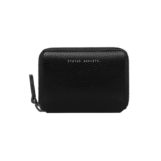 Front view of the Status Anxiety Wallet Wayward Black from shrunken pebble leather with zipper, silver foil logo and 9 slots.