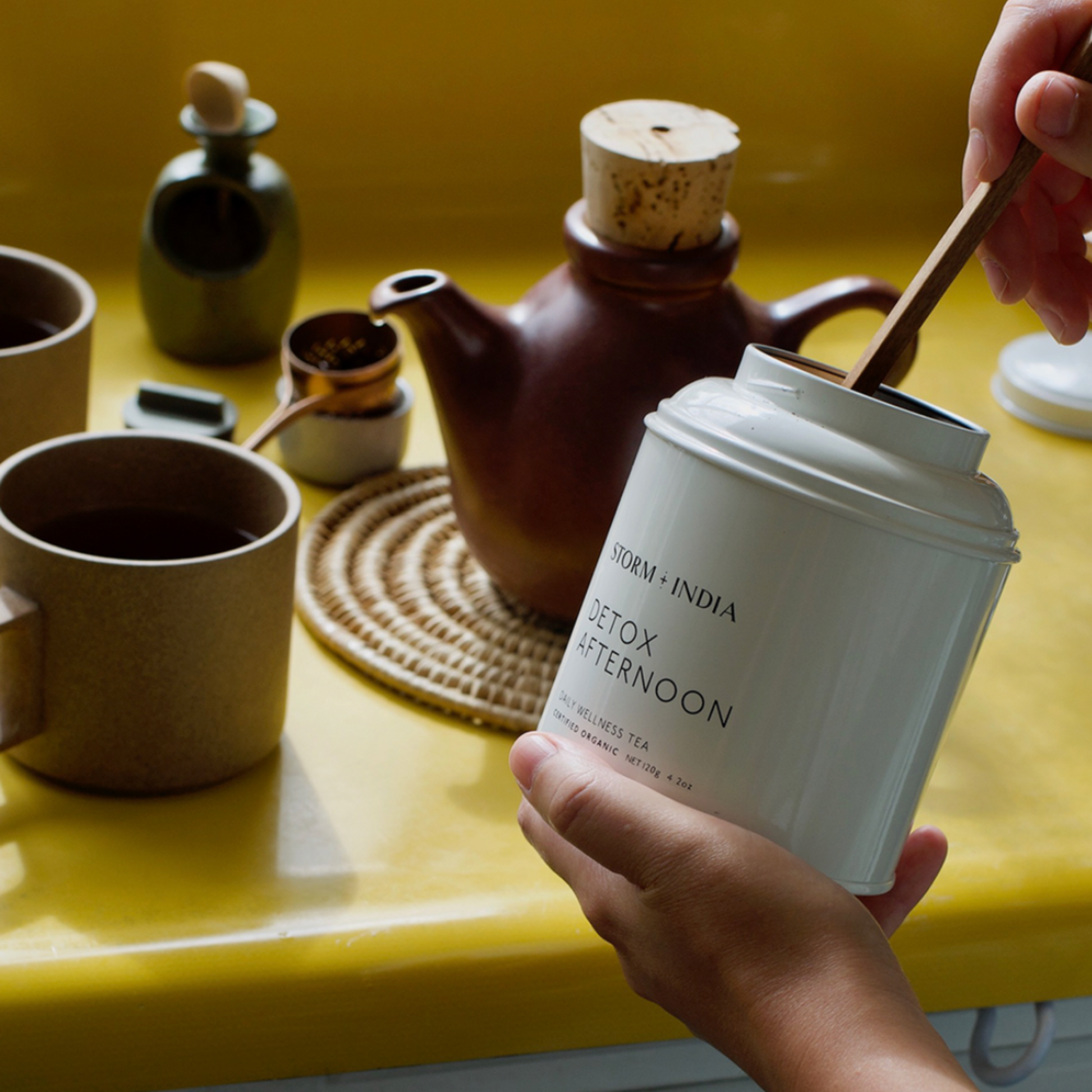 Storm and India Loose Leaf Tea in Tin 120g Detox Afternoon being used in yellow kitchen to brew tea