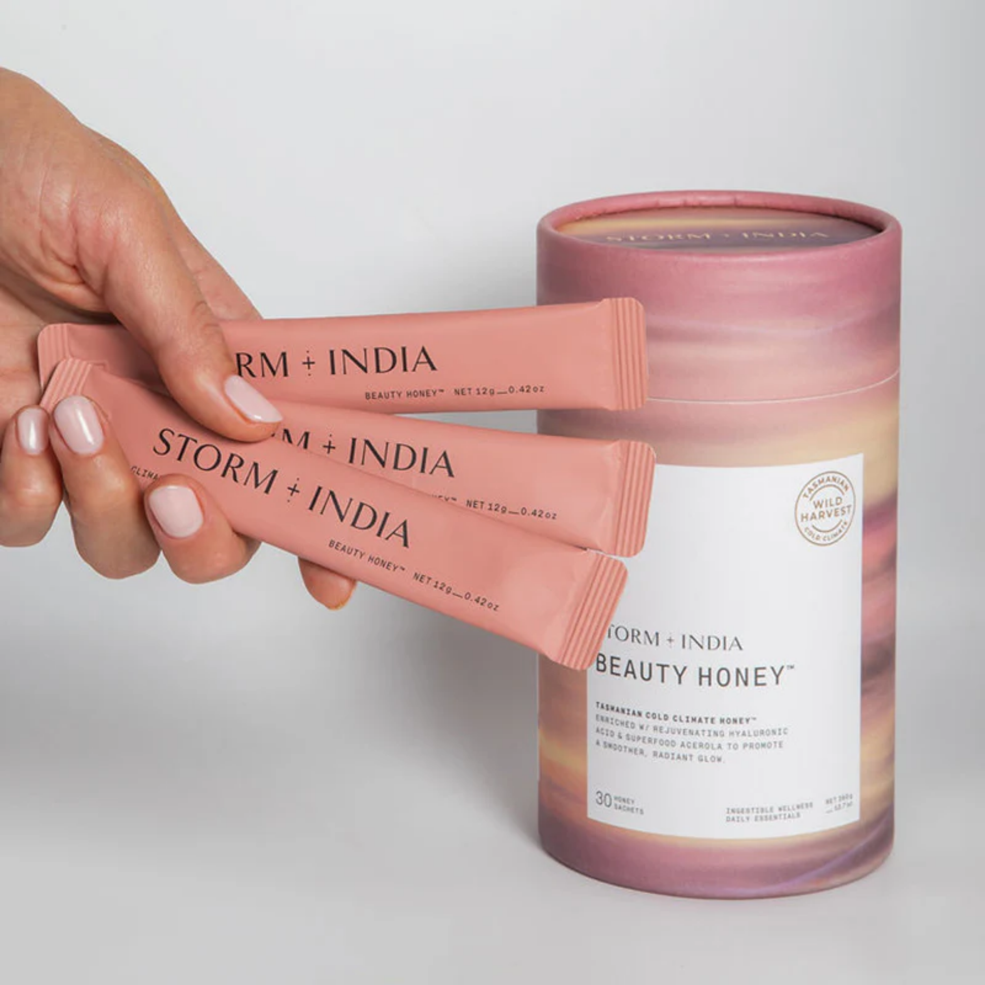 Sachet and container of Storm + India Beauty Honey, 360g/30 sachets, a buttery yellow blend of Tasmanian Cold Climate Honey? with Hyaluronic Acid, Gotu Kola, and Shiitake Mushroom.