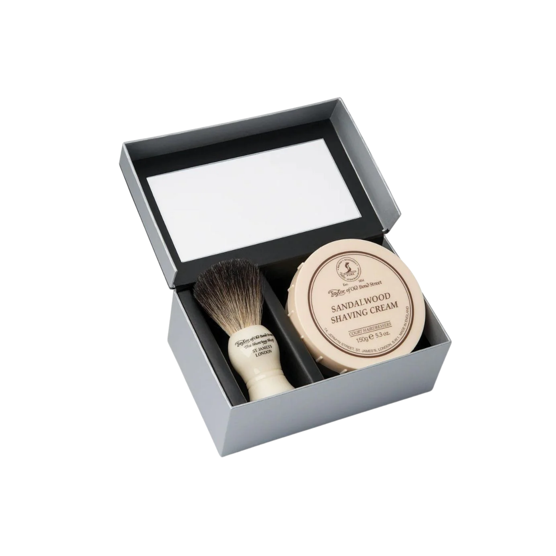 Shaving set box with shaving cream bowl and shaving brush in box with open lid front view