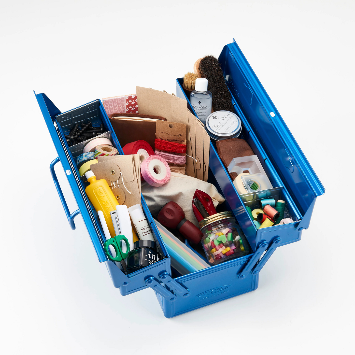 Showing hand tools inside the Toyo Toolbox Cantilever ST-350 Titanium crafted from pressed steel from a single sheet with sleek and stylish design, dual handle two tier design, comes with 8 removable tray dividers.