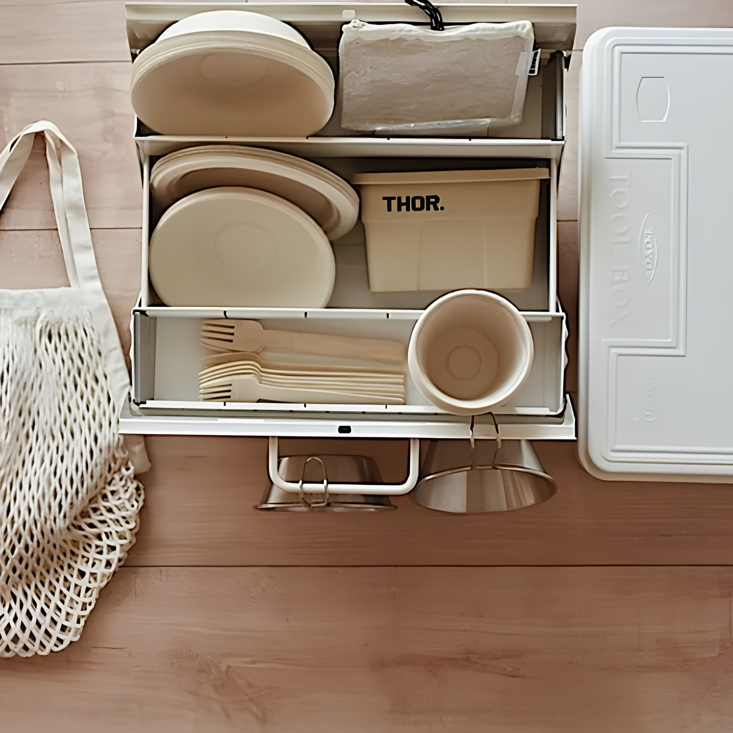 Toyo Toolbox Cantilever ST-350 White Steel Matte with superior storage capacity and sleek stylish design, featuring double handle and two level layout and 8 removable tray dividers, seen with food utensils inside.