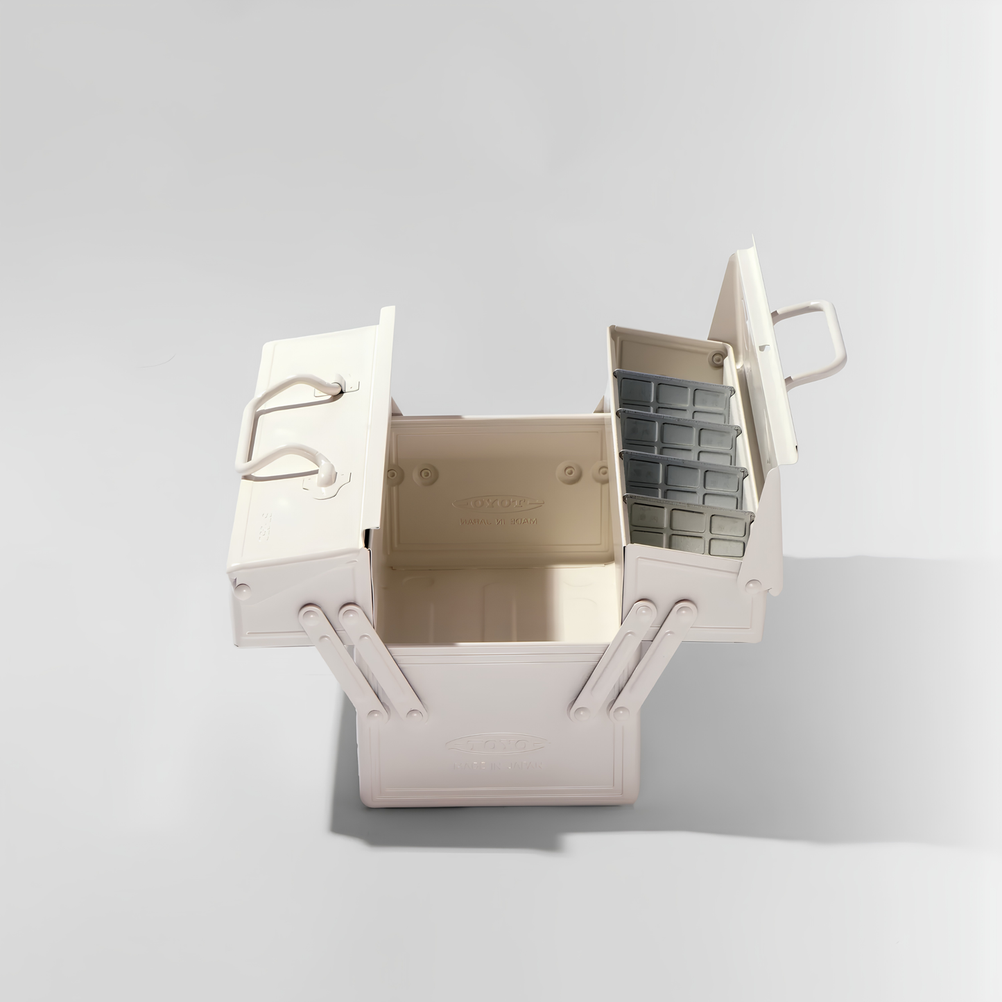 One side open Toyo Toolbox Cantilever ST-350 White Steel Matte with superior storage capacity and sleek stylish design, featuring double handle and two level layout and 8 removable tray dividers.
