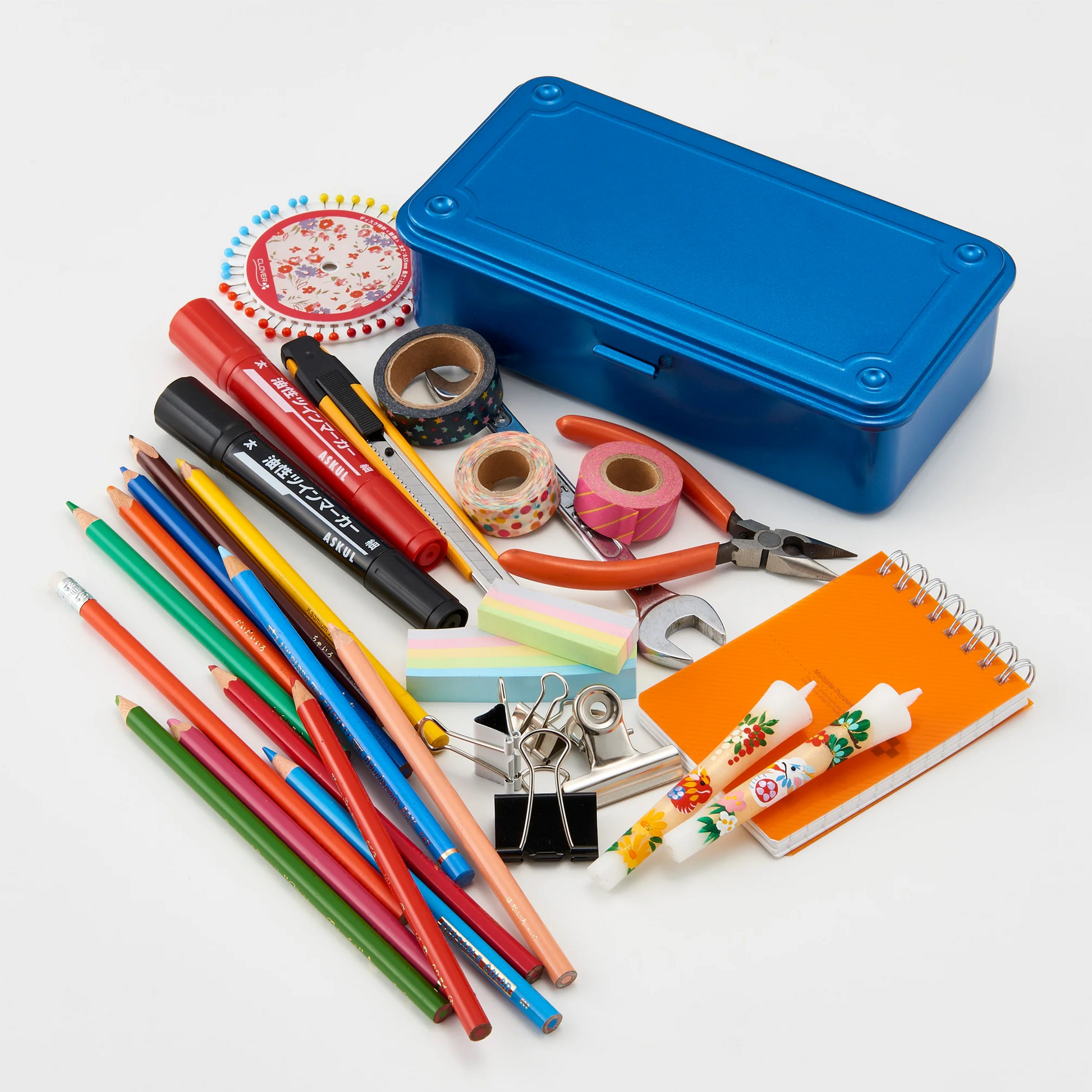 Small hand tools seen with the Toyo Toolbox Trunk Shape T-190 Blue from pressed steel, palm size design and has matte texture as general storage box