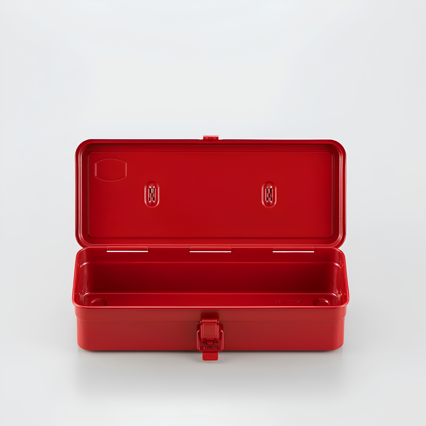 The red Toyo Toolbox Trunk Shape T-320 showing the inside, the toolbox is crafted from a single pressed steel, smooth and rounded design with matte texture that's gentle on hands.