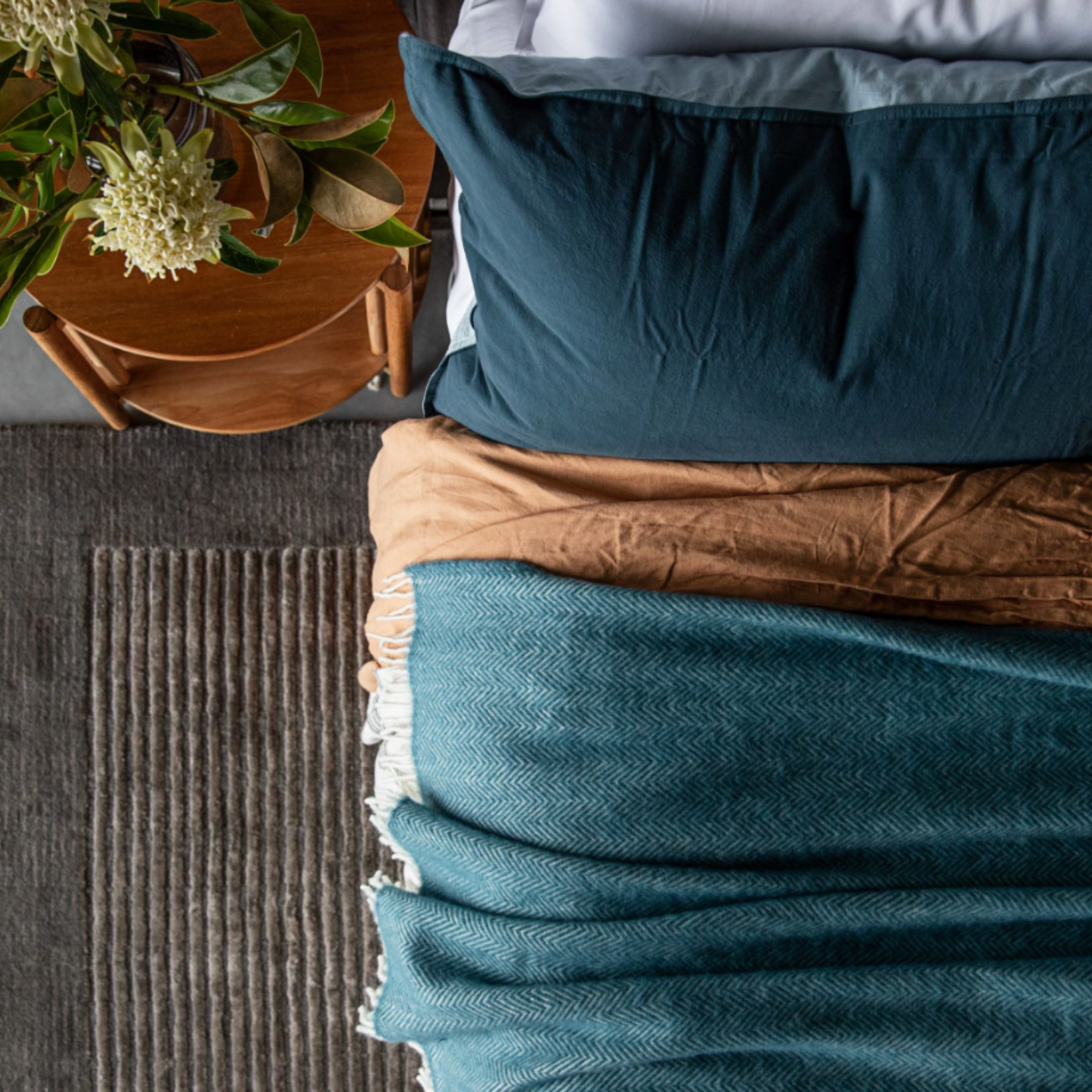 Waverly Mills indian teal herringbone throw on bed