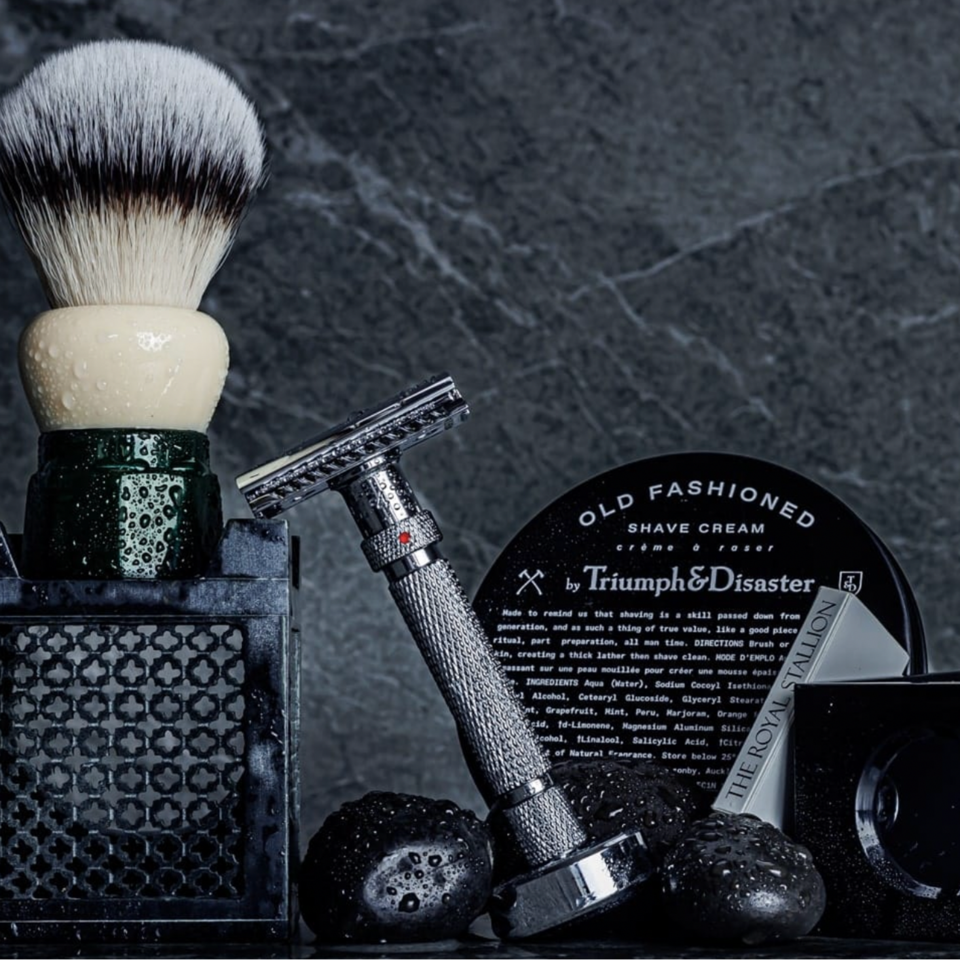 Yaqi Shaving Brush Synthetic Obsidian in bathroom with assorted shaving equipment and accessories 